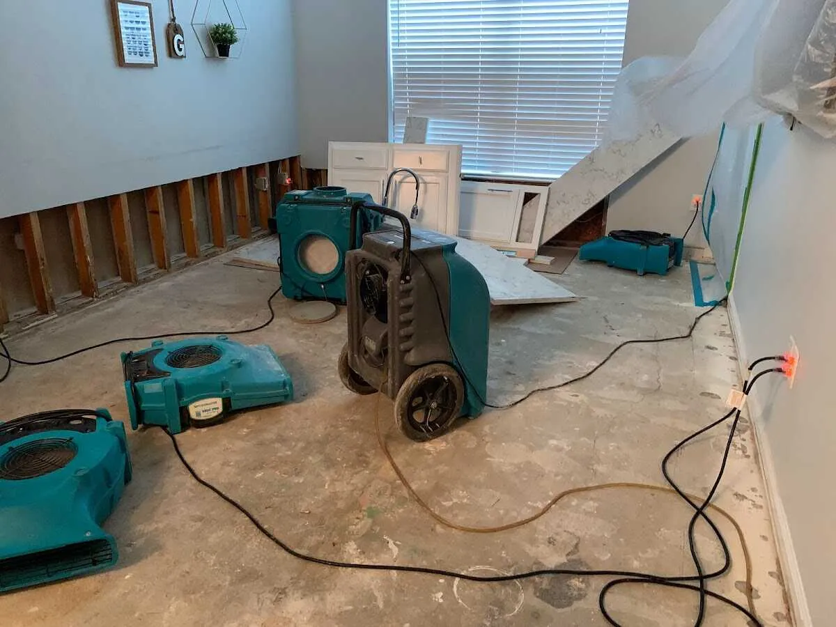 Dehumidifier in flood-cut room for Water Damage Restoration in Lakehills